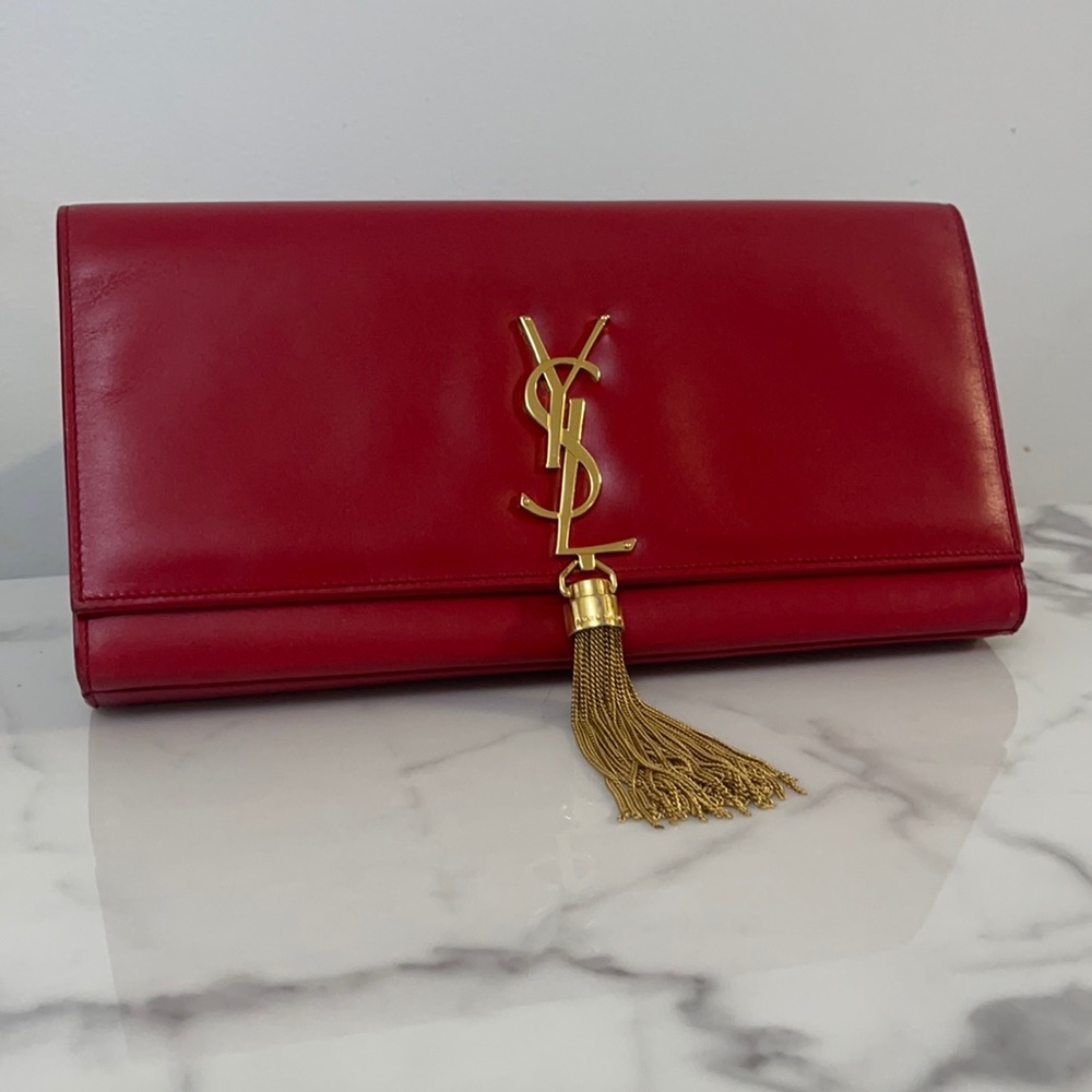 YSL clutch red with gold tassel